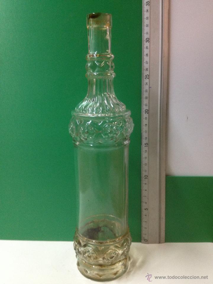 Botellas antiguas: BOTELLA CON BONITOS DIBUJOS Y RELIEVES - Foto 1