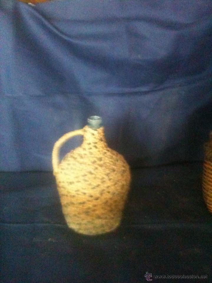 Botellas antiguas: DAMAJUANA FORRADA - Foto 1