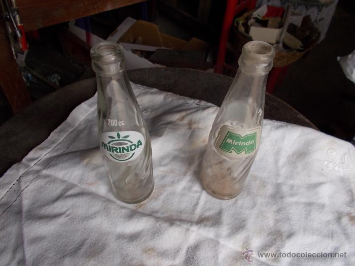 Botellas antiguas: 2 botellas Mirinda serigrafiadas - Foto 1