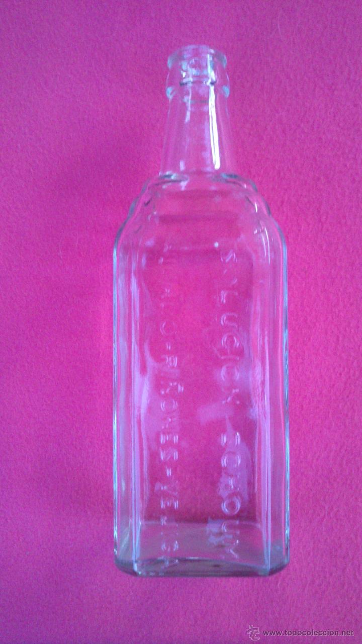 Botellas antiguas: Antigua Botella de Soluci&oacute;n Schoum - Foto 1