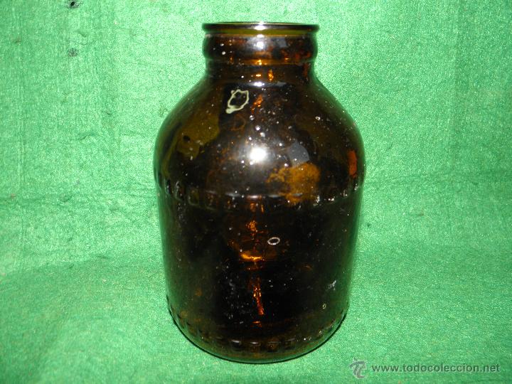Botellas antiguas: BOTELLA DE LECHE CONDENSADA AMBAR - Foto 1