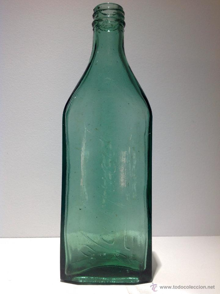 Botellas antiguas: ANTIGUA BOTELLA FRASCO DE ELIXIR YODOFUCOL. - Foto 1