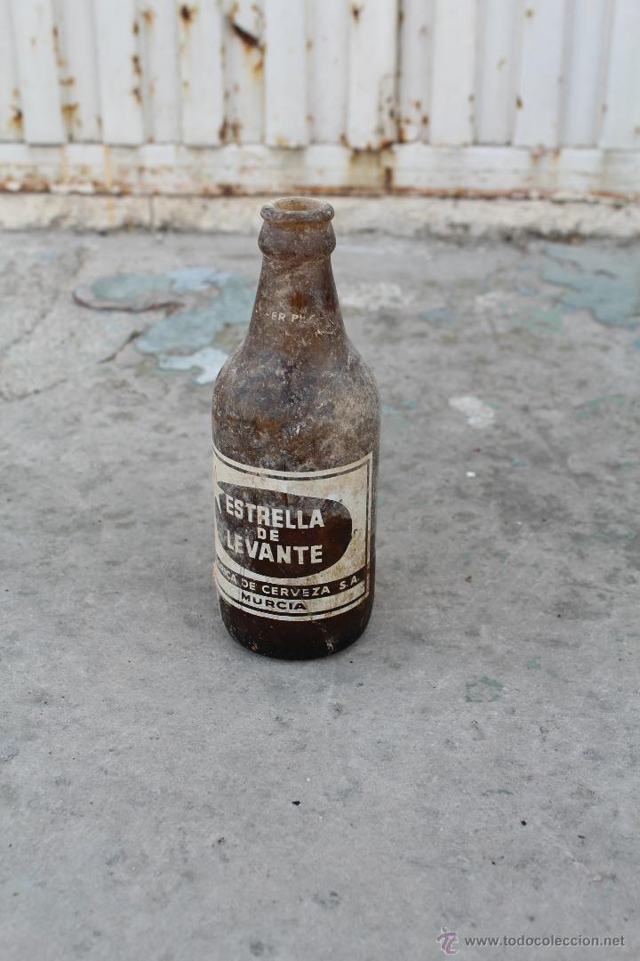 Botellas antiguas: BOTELLA estrella de levante - Foto 1
