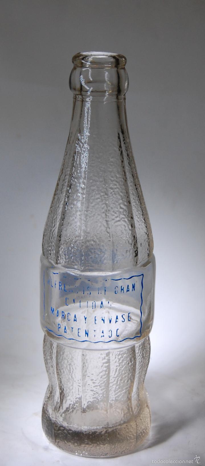 Botellas antiguas: BOTELLA DE ZUMO DUX - Foto 2
