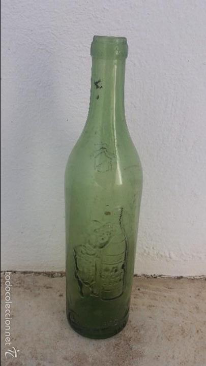 Botellas antiguas: Botella antigua de ponche caballero - Foto 1