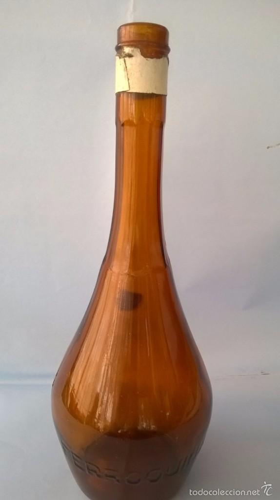 Botellas antiguas: FERROQUINA - CALISAY - Foto 1