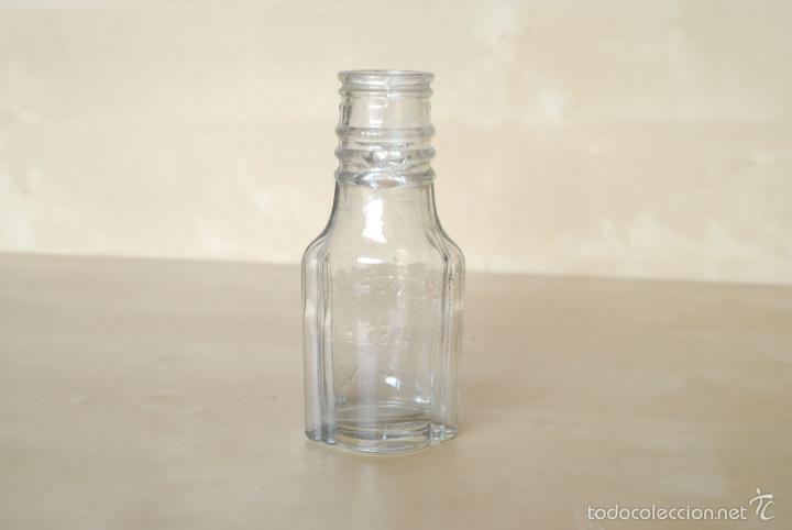Botellas antiguas: Botella de cristal de conservas Ulecia. logro&ntilde;o - Foto 2
