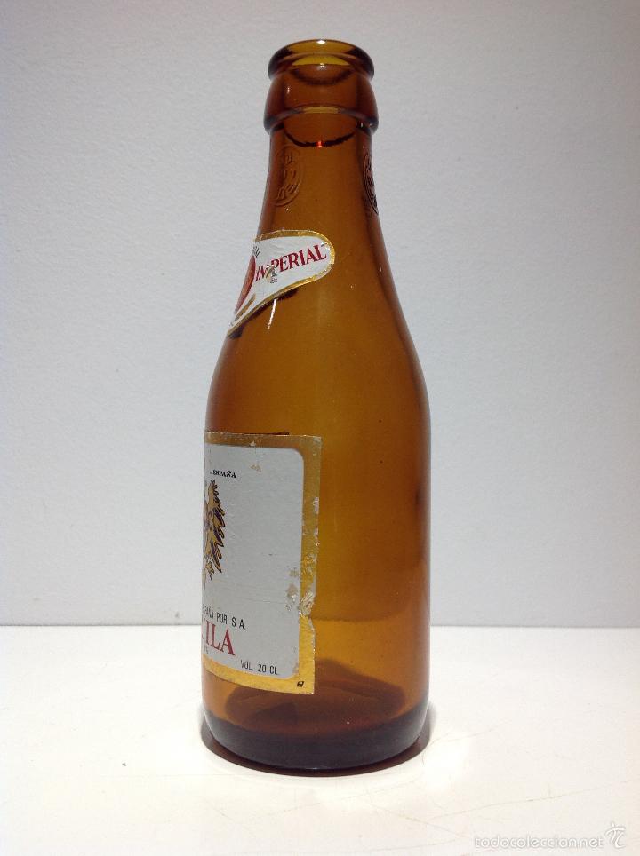 Botellas antiguas: Botella de cerveza El Águila Imperial. 20cl. Etiqueta de papel - Foto 2 - 62001436