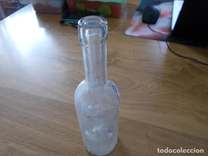 Botellas antiguas: BOTELLA ELIXIR ESTOMACAL SAIZ DE CARLOS - Foto 1