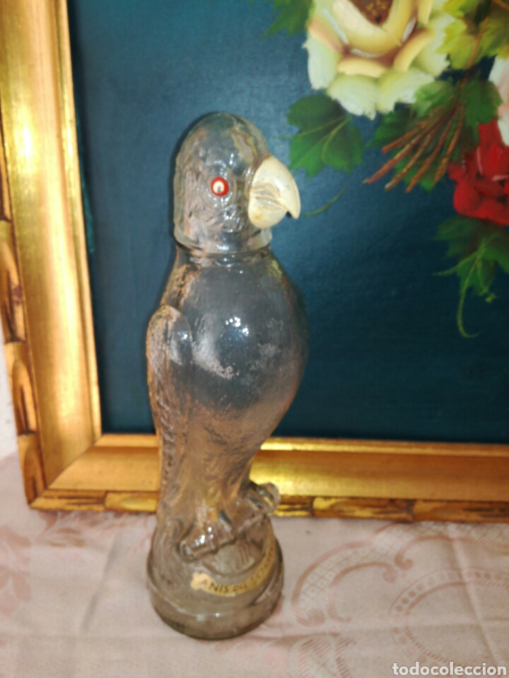 Botellas antiguas: Antigua botella de Anis del Lorito - Foto 1
