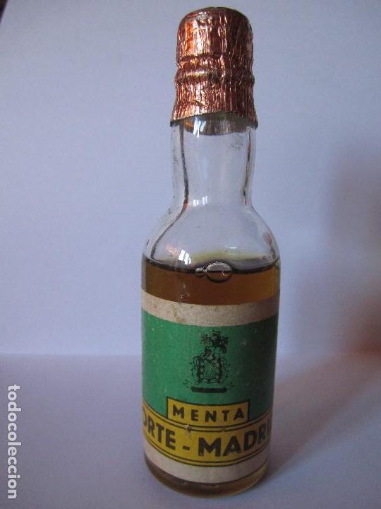 Botellas antiguas: peque&ntilde;a botella menta orte madrid - Foto 1