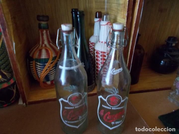 Botellas antiguas: Pareja de antiguas botellas de la casera - Foto 1