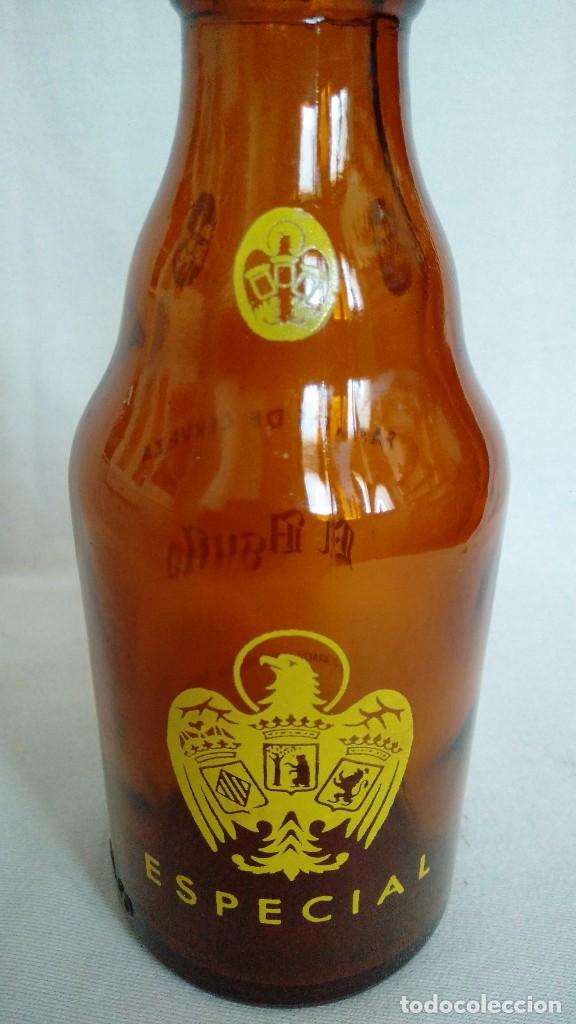 Botellas antiguas: BOTELLA DE CERVEZA EL AGUILA 33 cc. - Foto 3