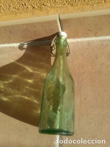 Botellas antiguas: botella agua oxigenada foret - Foto 1