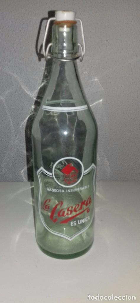 Botellas antiguas: preciosa botella la casera - Foto 1