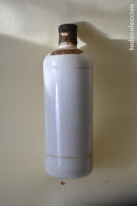 Botellas antiguas: CURACAO BLANCO EN BOTELLA DE CERAMICA - Foto 1