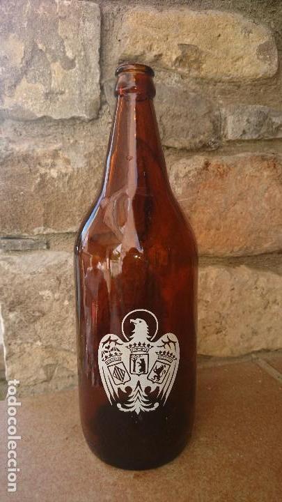Botellas antiguas: Botella Cerveza El Aguila - Foto 1