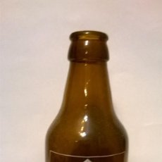 Botellas antiguas: BOTELLA CERVEZA CALATRAVA CEMANSA 1/5. Lote 143620762