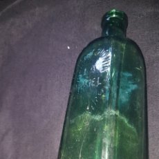 Botellas antiguas: ANTIGUA BOTELLA RELIEVE AGUA DE COLONIA LA CARMELA LÓPEZ CARO BARCELONA. Lote 144936966