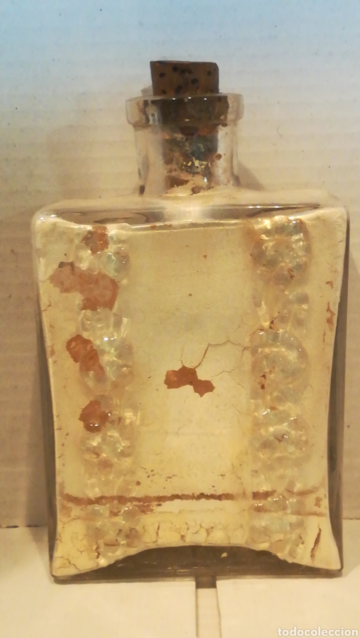 Botellas antiguas: Botella con flores - Foto 1