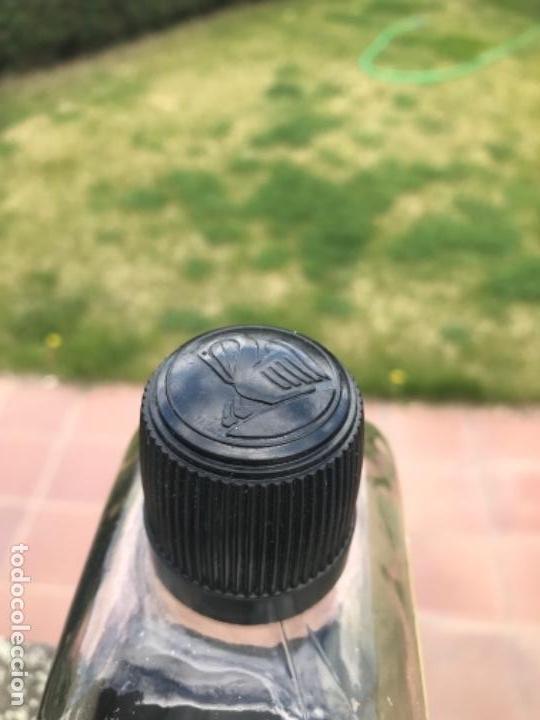 Botellas antiguas: Pelican, botella tina - Foto 2