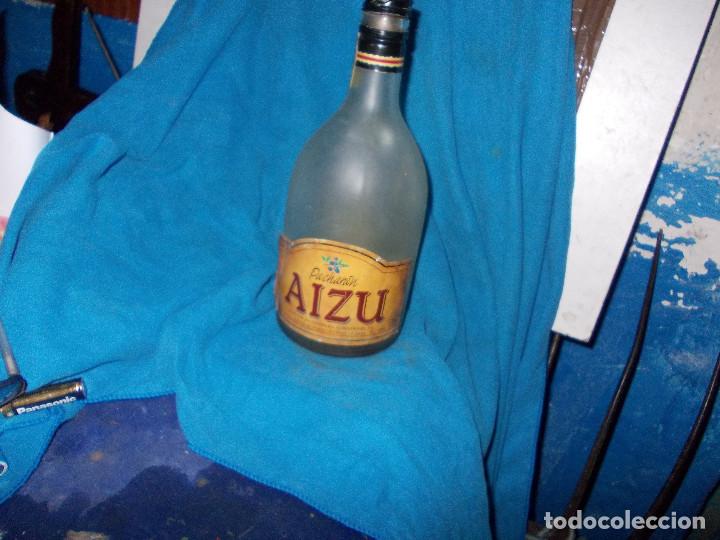 Botellas antiguas: botella aizu - Foto 1