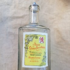 Botellas antiguas: ANTIGUA BOTELLA DE COLONIA CONCENTRADA ALVAREZ GOMEZ MADRID. Lote 202878777