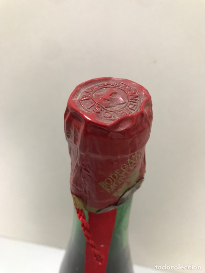 Botellas antiguas: BOTELLA DE VINO EL CACHIRULO - Foto 3