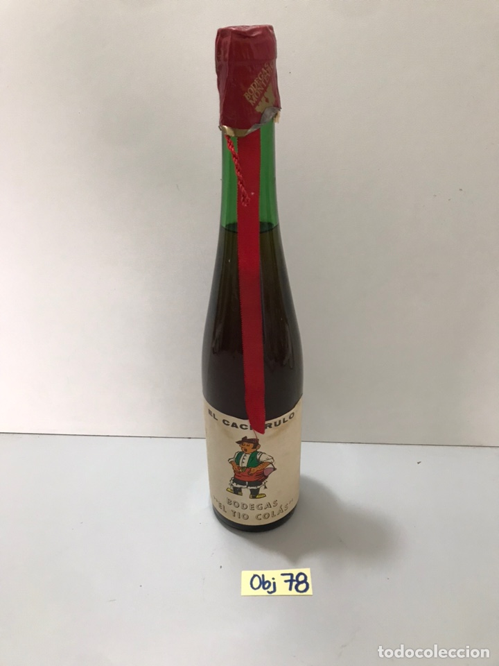 Botellas antiguas: BOTELLA DE VINO EL CACHIRULO - Foto 1