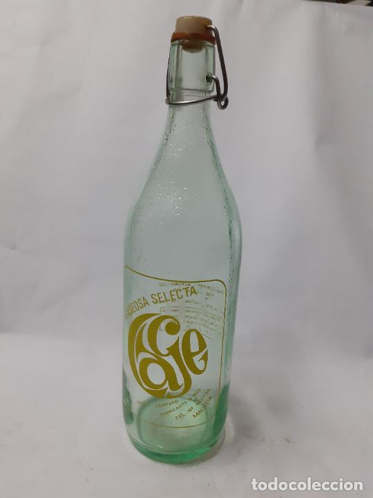 Botellas antiguas: BOTELLA DE GASEOSA AJE DE MACEDA - Foto 1
