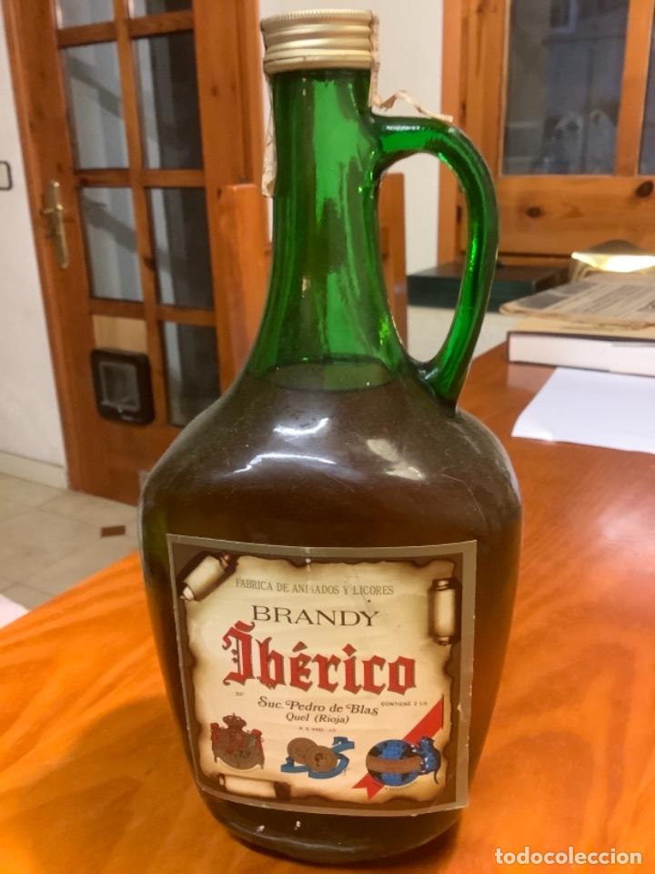 Botellas antiguas: BRANDY IBERICO BOTELLA DE 2 LITROS - Foto 1