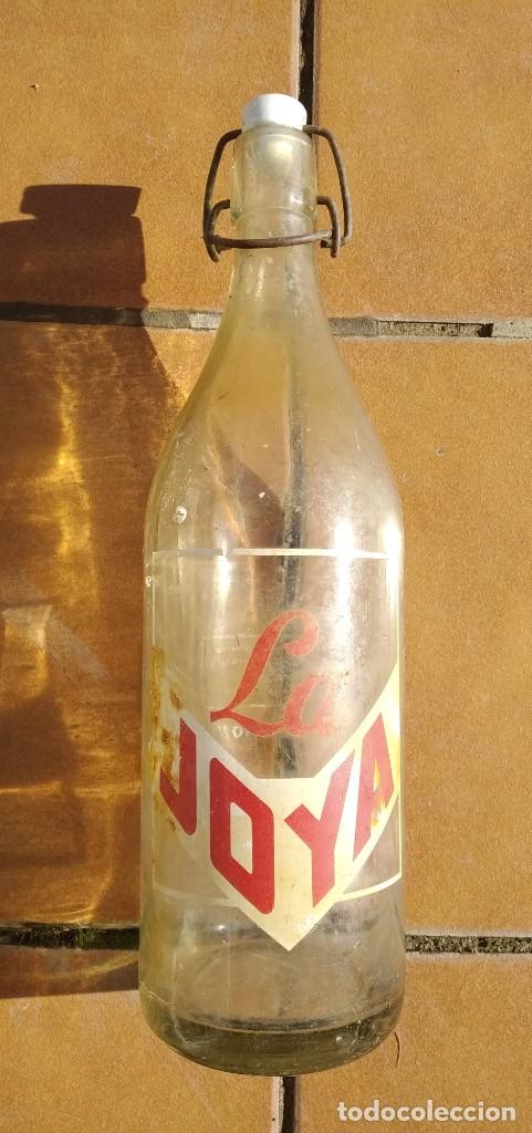 Botellas antiguas: BOTELLA GASEOSA ESPUMOSOS LA JOYA - Foto 1