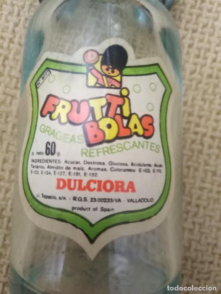 Botellas antiguas: Botella miniatura Frutti Bolas Dulciora - Foto 2