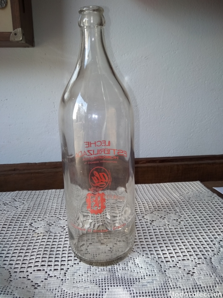 Botellas antiguas: BOTELLA DE LECHE ALY .LE&Oacute;N - Foto 2