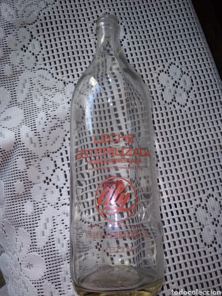 Botellas antiguas: BOTELLA DE LECHE ALY .LE&Oacute;N - Foto 3