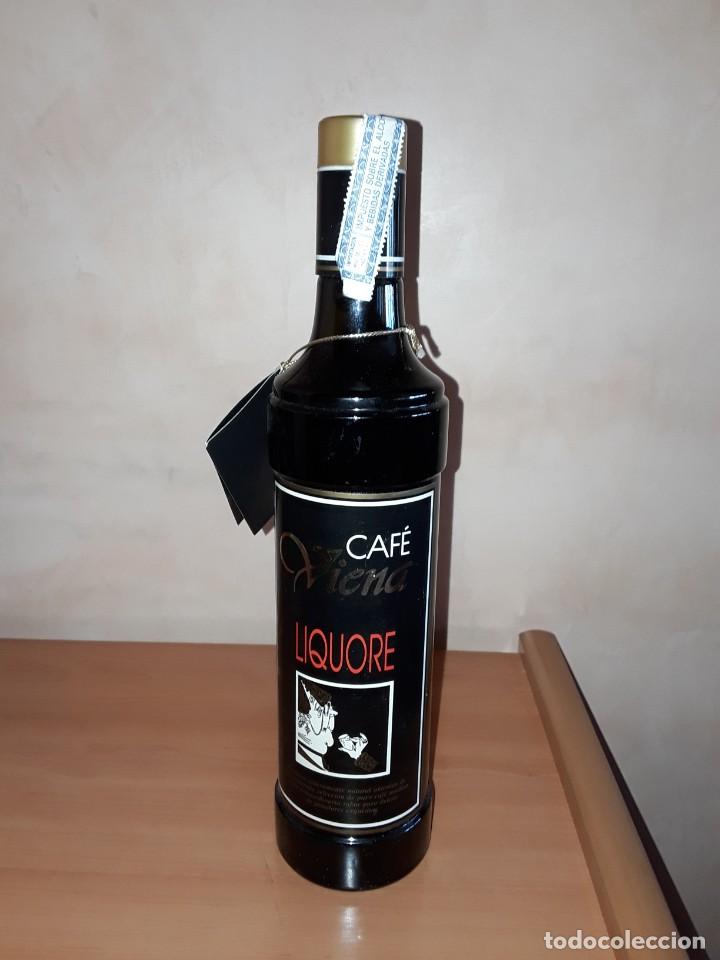 Botellas antiguas: Botella antigua de licor de caf&eacute; - Foto 1