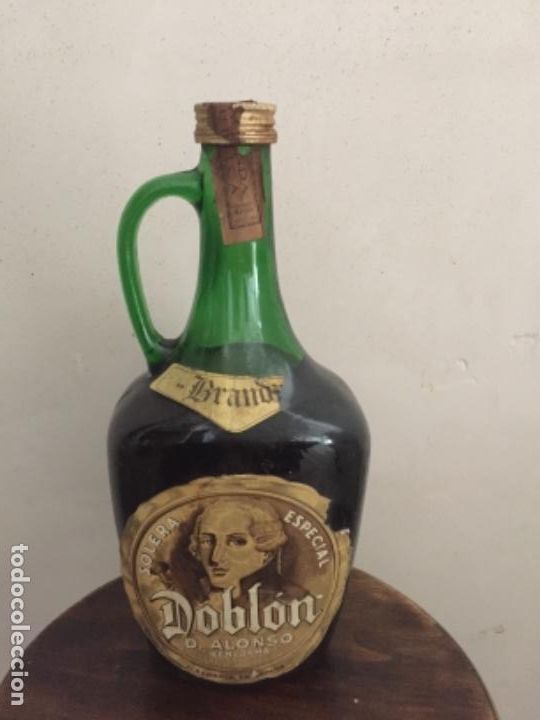 Botellas antiguas: Original Botella de Brandy Doblon Solera Especial - Foto 1