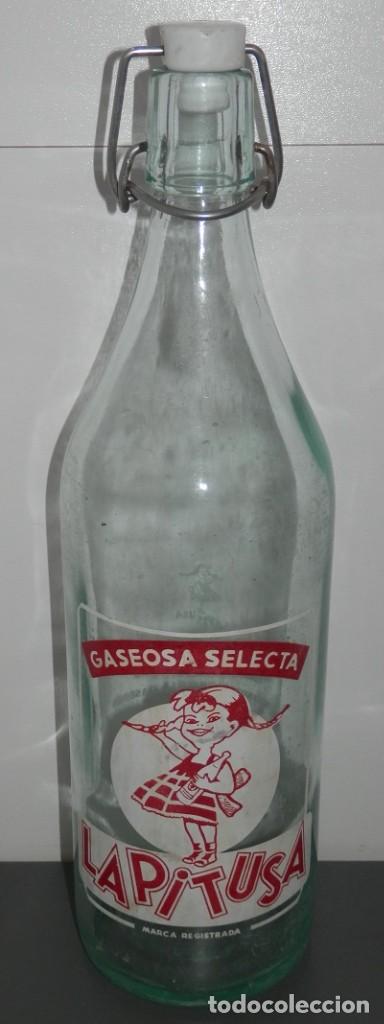 Botellas antiguas: BOTELLA ANTIGUA DE LA GASEOSA LA PITUFA - Foto 1