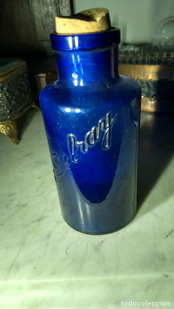 Botellas antiguas: Botella de cristal azul. Caf&eacute;s Debray - Foto 1