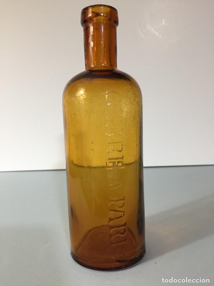 Botellas antiguas: Botella ambar COIRRE A PARIS - Foto 1