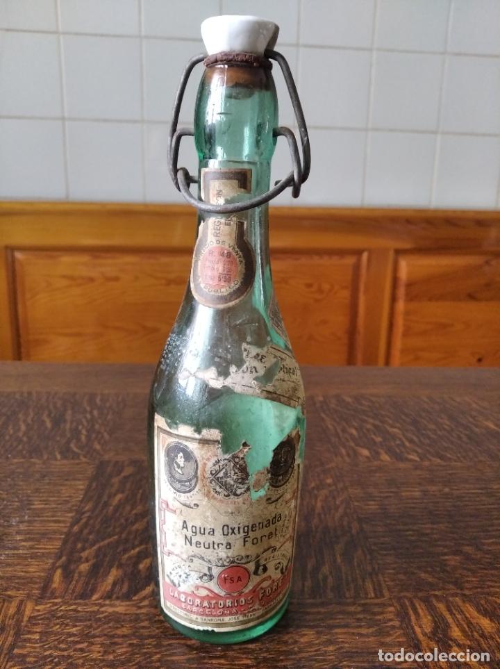 Botellas antiguas: BOTELLA AGUA OXIGENADA NEUTRA FORET - Foto 1