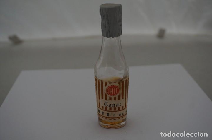 Botellas antiguas: BOTELLIN - CO&Ntilde;AC ORTE - Foto 1