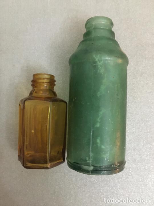 Botellas antiguas: dos botes peque&ntilde;os, uno de sidol, de excavaci&oacute;n - Foto 1