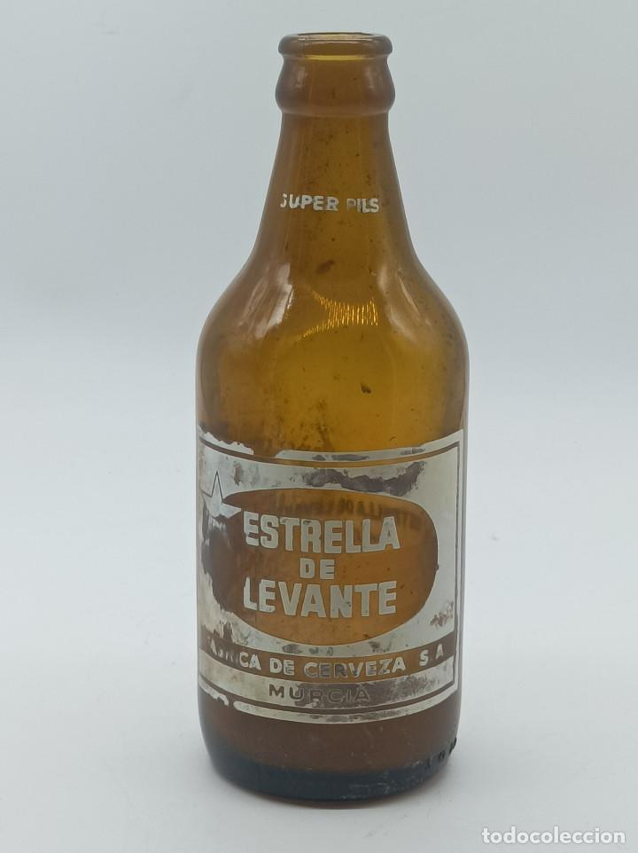 Botellas antiguas: BOTELLA ESTRELLA LEVANTE - Foto 1