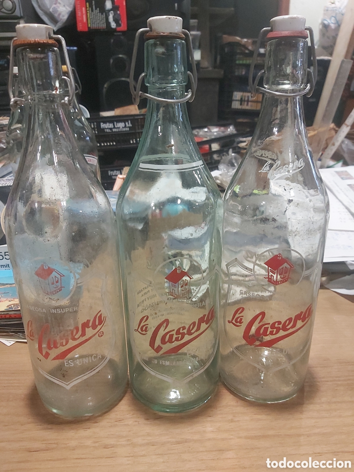 Botellas antiguas: Lote gaseosa la casera distintas - Foto 1