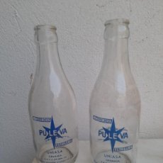 Botellas antiguas: 2 BOTELLAS DE LECHE PULEVA UNIASA GRANADA