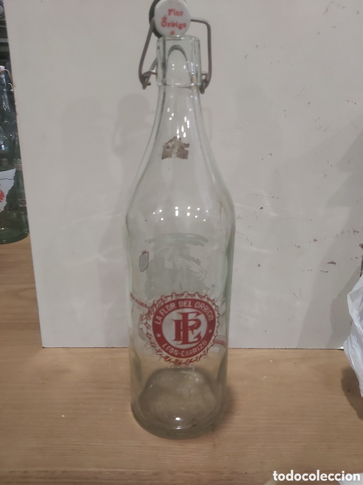 Botellas antiguas: Le&oacute;n la flor de orbigo carrizo - Foto 1