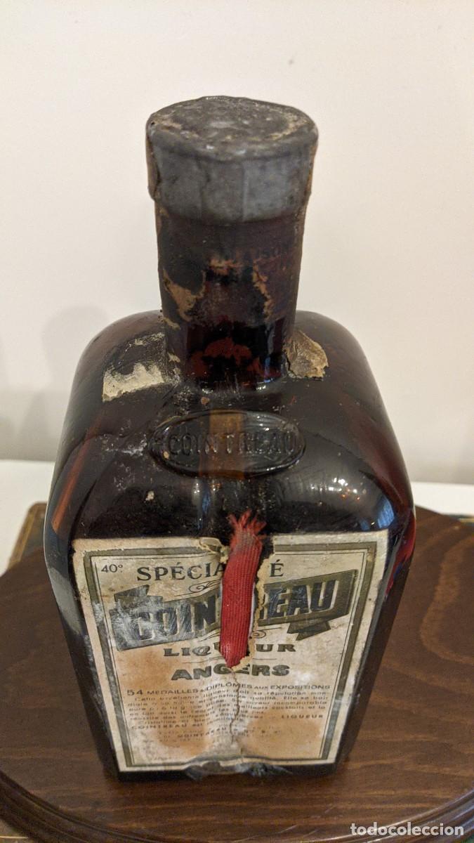 Botellas antiguas: ANTIGUA BOTELLA COINTREAU - Foto 6