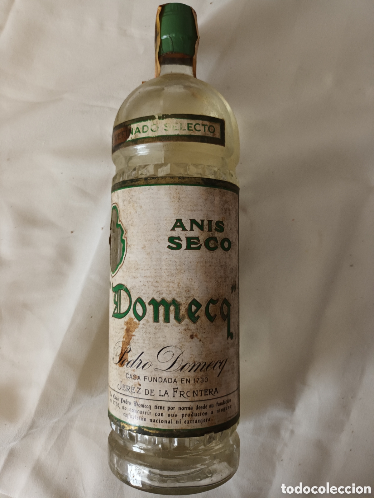 Botellas antiguas: Antigua botella de An&iacute;s Pedro Domecg - Foto 1