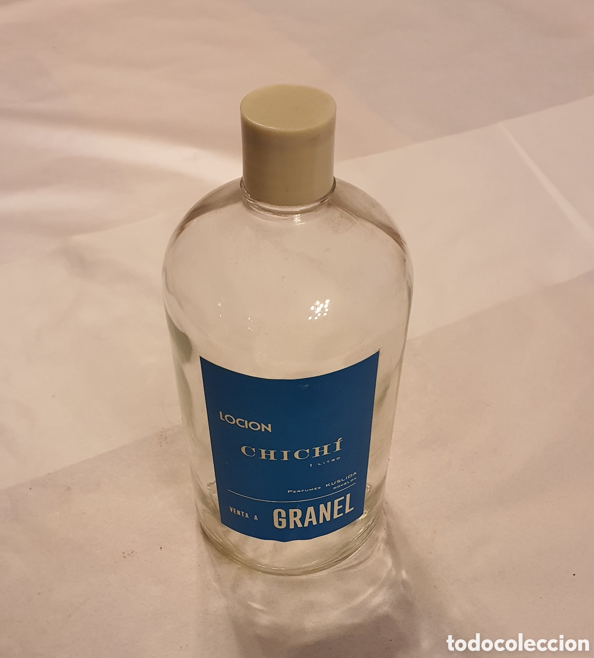 Botellas antiguas: Antigua botella colonia a granel - Foto 1